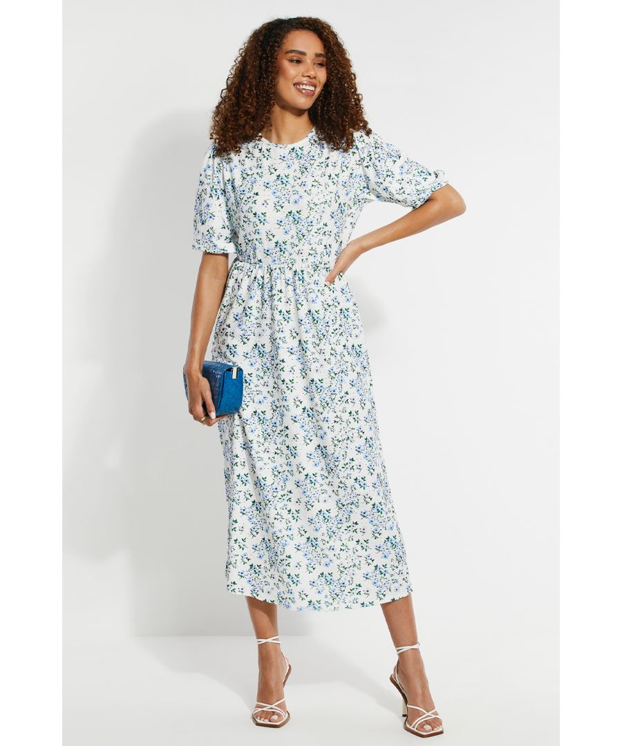 Freshen up your wardrobe with this floral midi smock dress from Threadbare. The dress features a round neckline, an empire waist, puff sleeves and a slip dress underneath. Team up with trainers for a casual look or heels for evenings out, other colours and styles are also available.