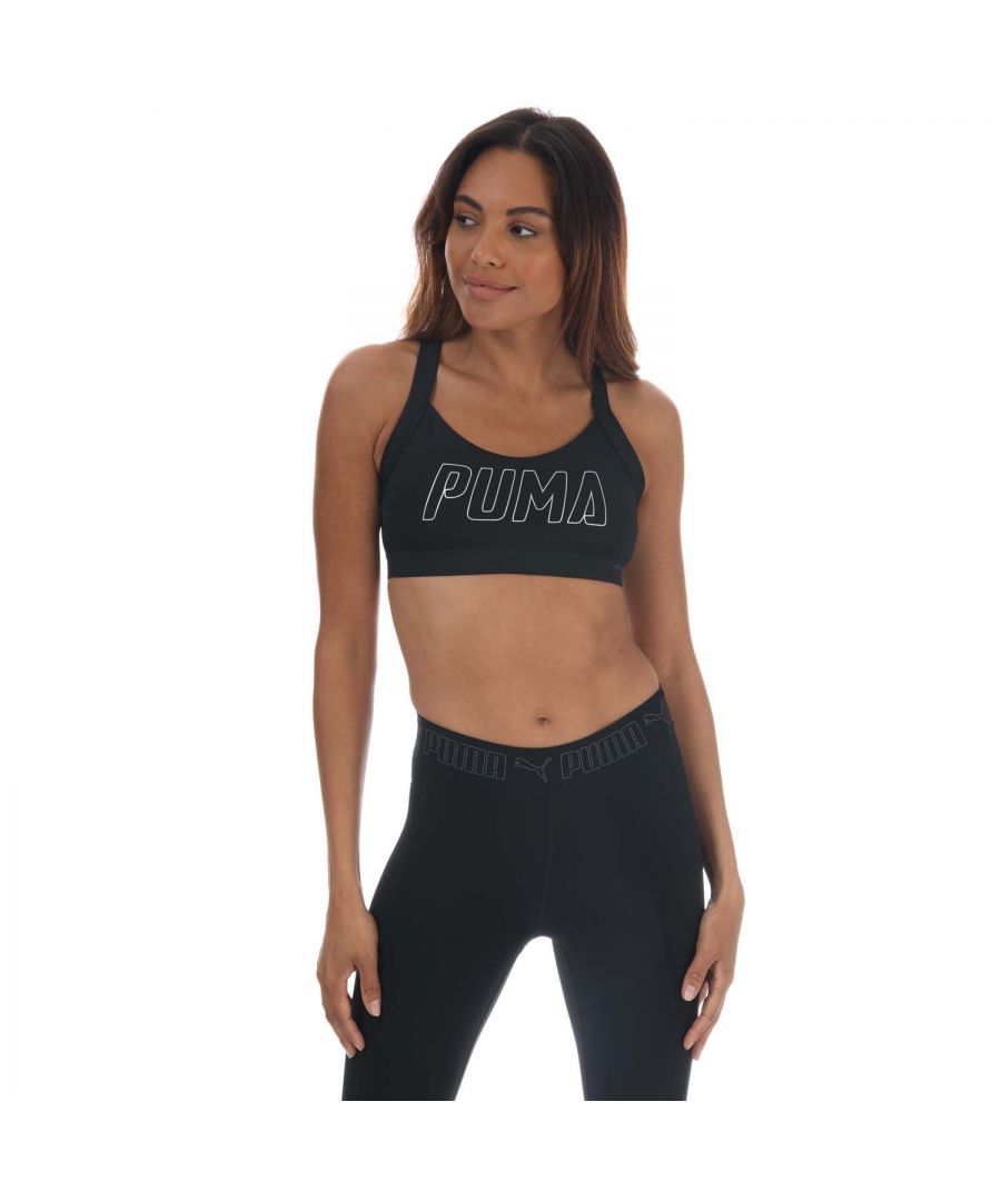 Womens Puma Training Bra in black.- Breathable spacer knit fabric adds lightweight padding and coverage.- Racerback design.- PUMA Cat Logo on back strap.- Shell: 85% Polyester  15% Elastane. Mesh: 87% Polyester  13% Elastane. Lining: 91% Polyester  9%  Elastane.- Ref: 51908501
