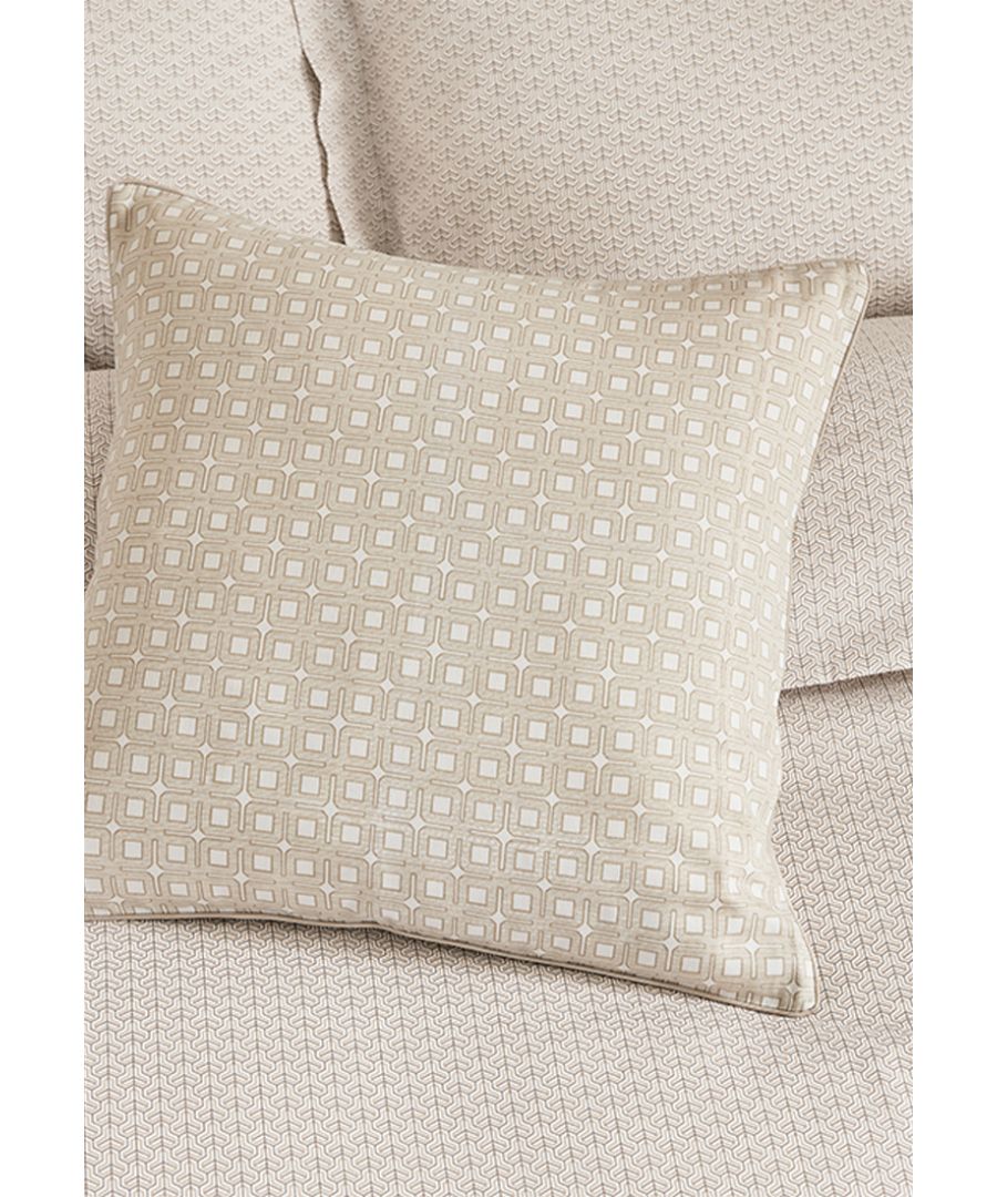 Nikko from Bedeck of Belfast Fine Linens displays a subtle yet sophisticated all over geometric tile print in silky 100% cotton sateen. Available in a choice of silver or linen. Enhance the look further with the coordinating Nikko cushion with repeat interlocking square design embossed with a textured finish and fine cord piping all in 100% cotton sateen also available in silver or linen. Feather filled, Made in India.
