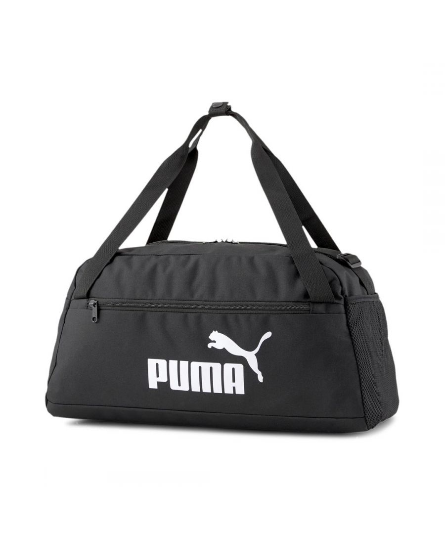 The Puma Phase Sports Holdall Bag comes designed to enable you to store all of your sports essentials and other equipment in a convenient, easy to access way. The bag comes with a two-way zip opening into main compartment and a elastic mesh pocket on right side. A padded botttom panel with two carry handles connectable through hook and loop closure. Also a adjustable shoulder strap, 150D Polyester lining with PU backing and a metal zip puller with webbing tapes on main compartment. Finished off with the PUMA No. 1 logo print on the front. Dimensions: 25cm H x 47cm W x 21 D