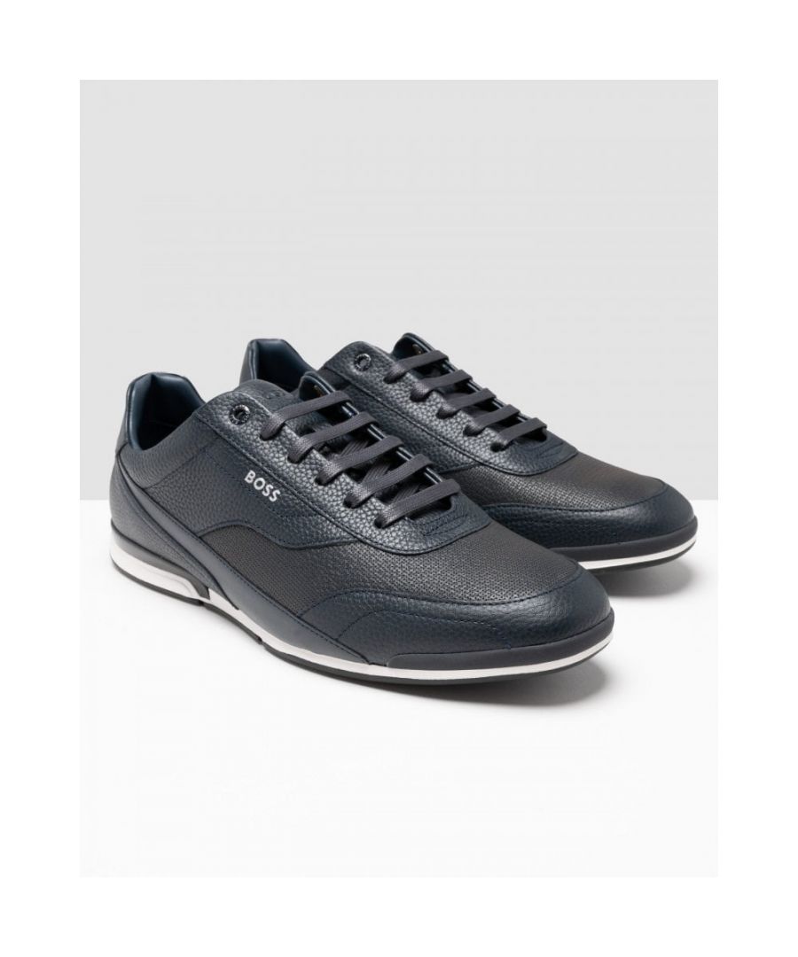 Sporty trainers by BOSS. Featuring branding at the tongue, side panel and back tab, these low-profile trainers are crafted in a combination of grained and perforated leather. \nLacesFully linedPackaging: Box           \nUpper material: 100% Cow skin, 50% Cotton, 100% Polyurethane, 50% ViscoseSole: 80% Rubber, 20% Thermoplastic polyurethaneFacing: 100% PolyurethaneInnersole: 50% Cotton, 50% Viscose\n50470378