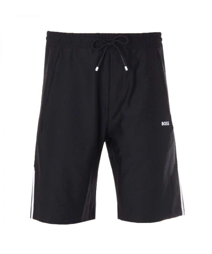 Infused with quick drying and moisture wicking performance these shorts from BOSS Athleisure are the perfect sporty pair to elevate your gym wear. Crafted from recycled polyester with innovative stretch and feature an elasticated drawstring waist, side seam pockets and sporty contrast stripe detailing down each leg. Finished with the new BOSS logo printed to the left leg. Regular Fit, Stretch Recycled Polyester, Quick Drying & Moisture Wicking, Elasticated Drawstring Waist, Twin Side Seam Pockets, Sporty Stripe Detailing, BOSS Branding. Style & Fit: Regular Fit, Fits True to Size. Composition & Care: 87% Recycled Polyester, 13% Elastane, Machine Wash.
