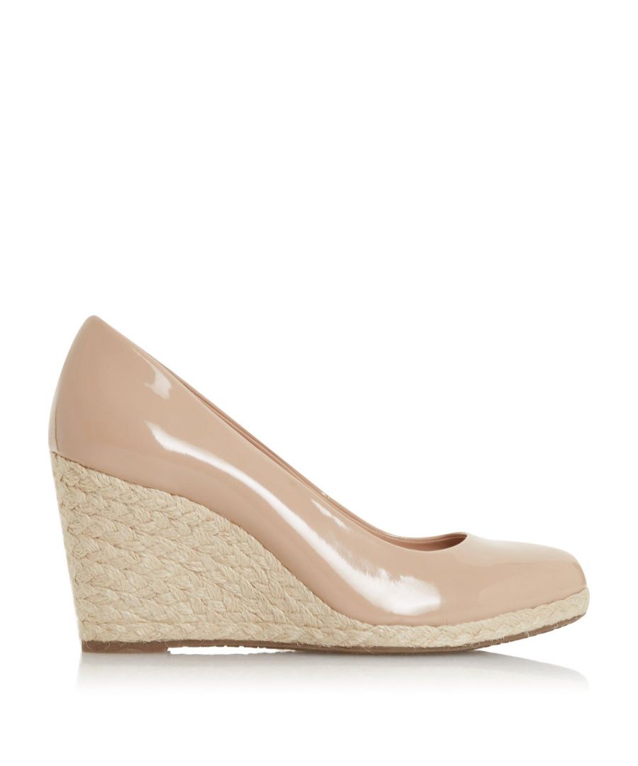 From Dune London, this shoe will make a chic addition to your collection. Resting on a medium wedge heel in an espadrille style rope finish. It comes in a slip on design with a textured upper and rounded toe.