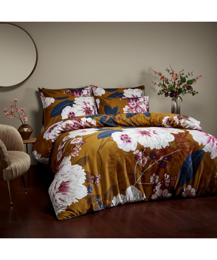 Taking inspiration from blossom in Japanese culture which is used as a reminder that the natural world is ever changing and that our time is precious. Using the effortlessness beauty of the blossom flower with a contracting colour palette to create a contemporary print design. The duvet set features a plain, tonal reverse that compliments the harmonious print. Includes 2 x pillowcases measuring 50 x 75cm.