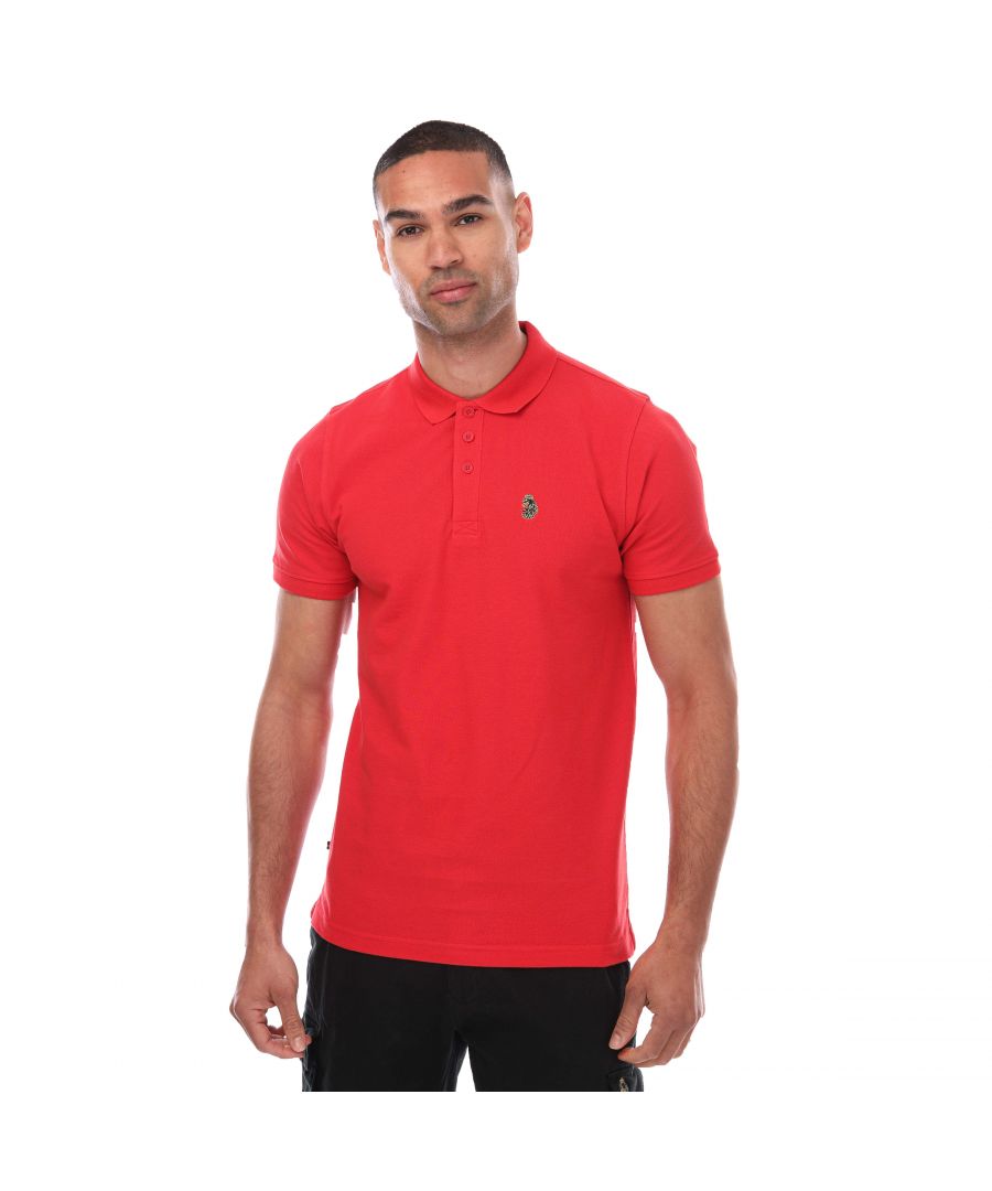 Mens Luke 1977 Williams OTB Polo Shirt in red.- Classic collar.- Three button placket.- Ribbed collar and cuffs.- Iconic LUKE tri-colour trim tape.- Embroidered lion on chest.- Straight split hem. - 100% Cotton.- Ref:ZM120101GMR