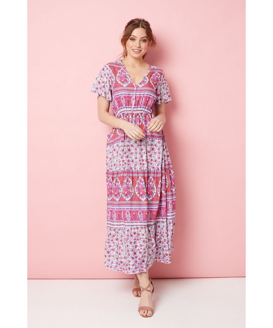Every collection needs a versatile floral midi dress. With a v-neck, short sleeves, a button detail front, a cinched waist, pockets and a flattering tiered midi skirt. Pair with blush heels for a daytime occasion or with flat sandals for a more casual look.