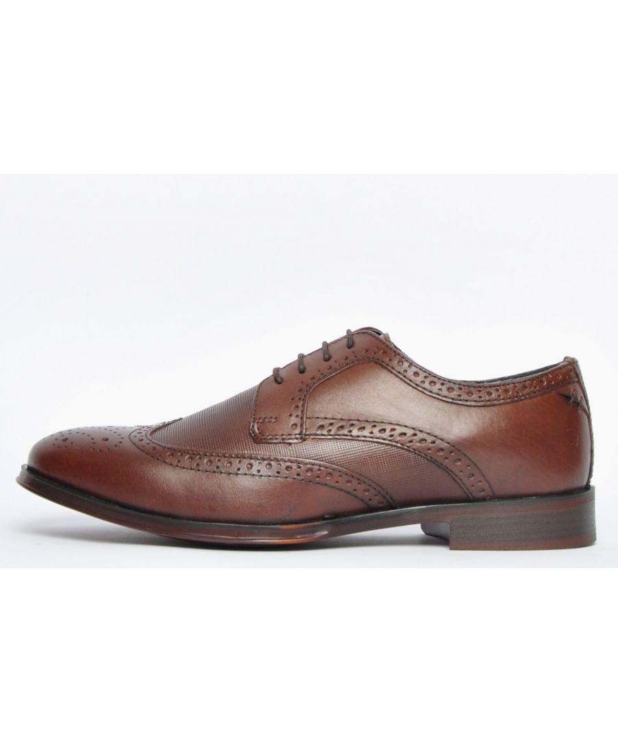 One of the longest standing styles the brogue is the epitome of quintessential British style, these Mantle brogue shoes are made from brown leather and lend serious style to the new season.\n This wing-tip brogue has all the details you need, formal in design and featuring designer led detailing throughout, the Mantle offers sophisticated designer style at a fraction of the normal high street price. These brogues are an ideal addition to your smart attire and provide a solid foundation to your formal suiting look. \n Perfect for work, casual or special occasions, theyre sure to make an instant impression on all who bear eyes upon them. \n - Premium leather upper \n - Iconic detailing throughout\n - Durable rubber outsole \n - Stylish slim midsole with heel\n - Secure lace-up system \n - Red Tape branding