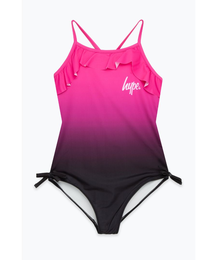 Swim is in. Meet the HYPE. Girls Pink Black Fade Frilly Script Swimsuit, the ultimate girls swimsuit you'll want to wear everyday of summer, autumn, winter and spring. Boasting frill detail, an all-over pink to black fade print, and the iconic HYPE. mini script logo in contrasting white. Wear with HYPE. sliders, swimming goggles and a beach towel in hand. Machine wash at 30 degrees.