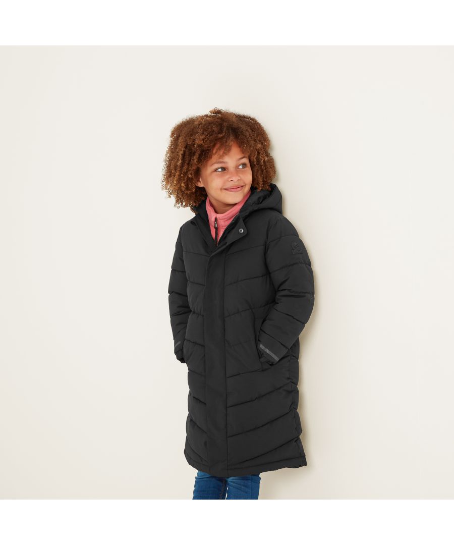 Designed by our team in West Yorkshire to stand up to the toughest winter days by keeping the wind out and the heat in, our Dollis kids coat feels so warm and cosy on it’s like wearing a duvet. This extra long coat is quilted in a chunky chevron design and is thickly padded with a warm, insulated eco filling made from recycled plastic bottles. There is a cosy fixed hood with a Velcro adjuster tab at the back for a custom fit and two lower pockets that are perfect for slipping cold hands into. Dollis is easy to get on and off thanks to a chunky two-way zip secured with press studs and Velcro, so it makes a great coat for school as well as action-packed weekends. There are neat reflective safety prints above the back hem and cuffs that stand out against car headlights for increased visibility at night and the finishing touch is an embossed rubber TOG24 Rose badge on the sleeve.