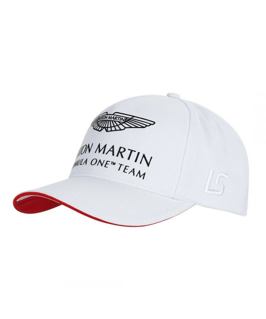 Feel like a member of the Team in our official Aston Martin Formula 1 Team Lawrence Stroll Cap.  Manufactured from quality cotton twill.  A tonal silicon woven badge with Aston Martin Formula One team logo.  A National flag of Canada graphic on the underside of cap.  Embossed with LS/18 on one side.  Classic snap back fastener on back.  The fit, shape and unique design of this cap was in collaboration with Lance Stroll, a celebrated Canadian racing driver.