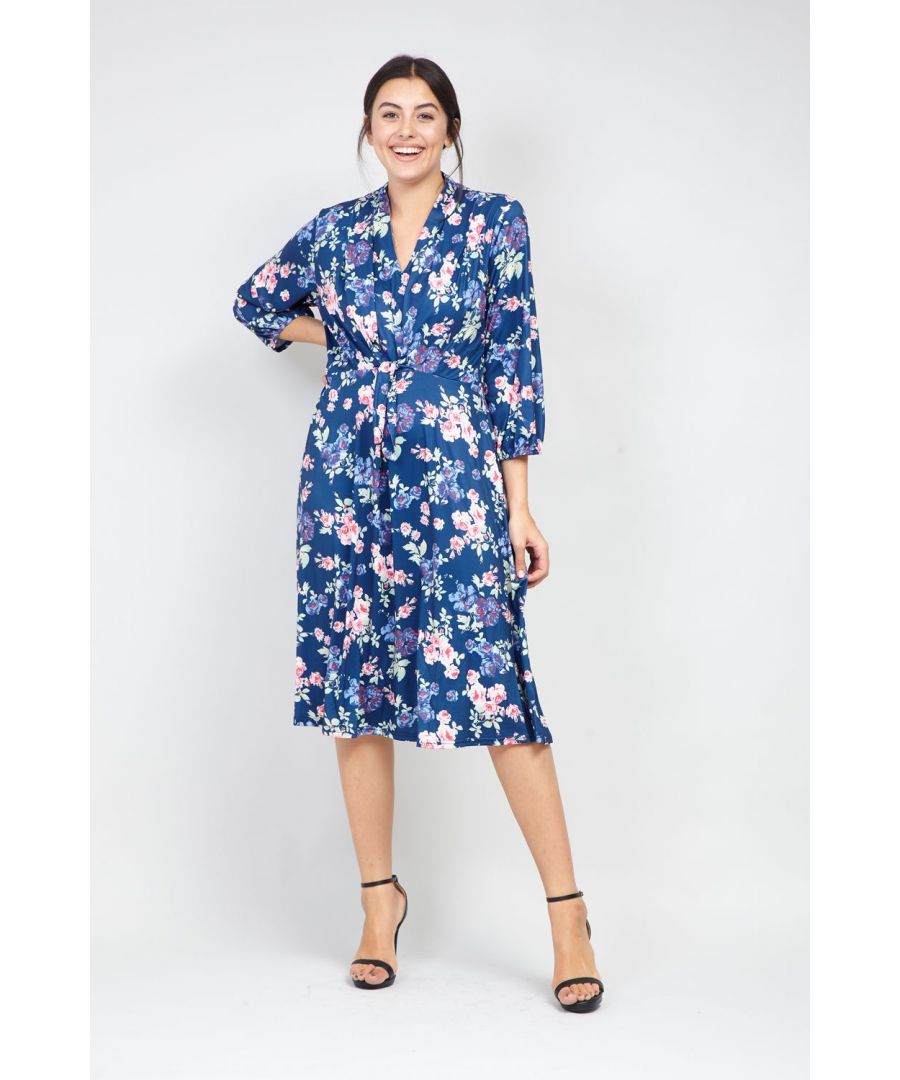 This floral printed dress is the perfect addition to your wardrobe. It  has a tie front ruched waist, ¾ length sleeves and a v-neck. Wear with strappy heels and a clutch to steal the show.