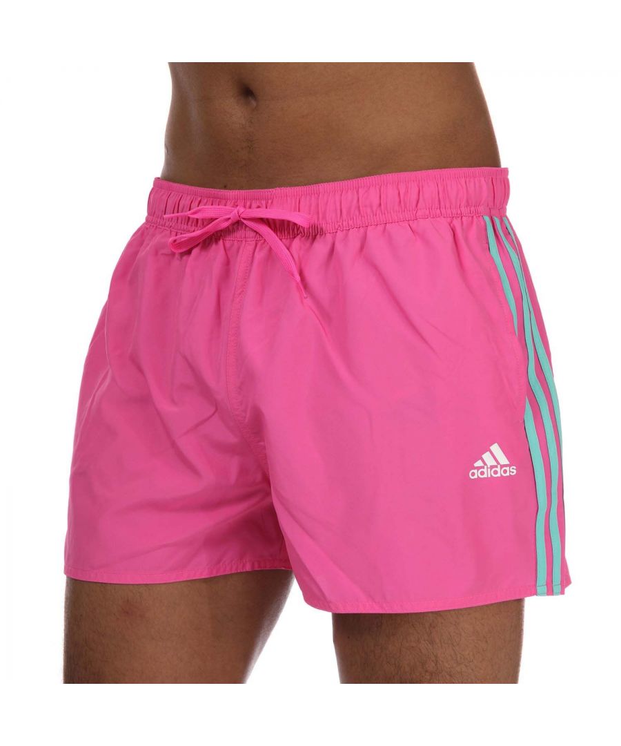 Mens adidas Classic 3- Stripes Swim Shorts in pink.- Drawcord on elastic waist.- Side pockets.- Mesh inner brief.- Quick-drying.- 3- Stripes.- Lightweight.- Main Material: 100% Polyester (Recycled). Inner Brief: 100% Polyester (Recycled). Machine washable.- Ref: GQ1101