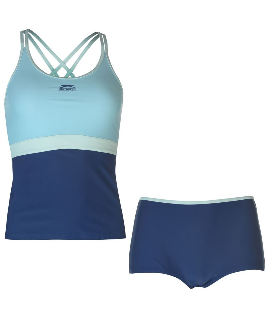 Slazenger Tankini Set Ladies Hit the pool with the Tankini Set from Slazenger. This two piece set comprises of short style bottoms and a full length vest - both of which consist of contrasting piping and the Slazenger logo. Made with chlorine-resistant LYCRA® fiber to last up to 10 times longer than those with ordinary elastane. > Please note: The style you receive may vary from the image shown.Tankini top: > Full length top > Racer back > Contrasting piping > Not wired > Slazenger logoBottoms: > Shorts style > Contrast piping > GussetBoth: > Slazenger branding > 82% Nylon / 18% chlorine resistant LYCRA® > Machine washable at 40 degrees