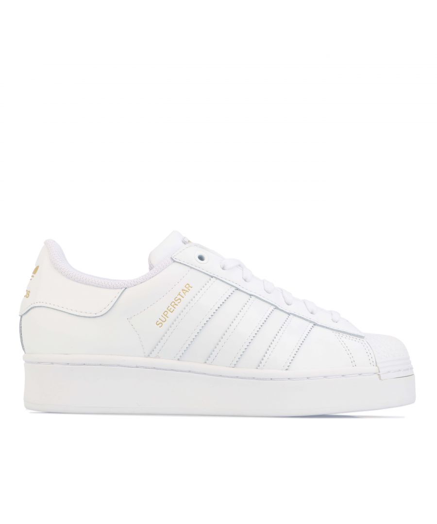 Womens adidas Originals Superstar Bold Trainers in white - gold.- Leather and synthetic upper.- Lace closure.- Regular fit.- Moulded sockliner.- Padded colour and tongue.- adidas branding.- Textile insole and Textile lining.- Durable rubber sole.- Ref: FV3334