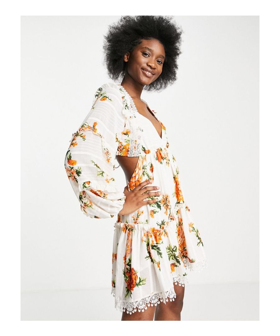 Mini dress by ASOS DESIGN Big floral energy Tiered design Plunge neck Volume sleeves Open back with tie fastening Contrast trims Regular fit  Sold By: Asos