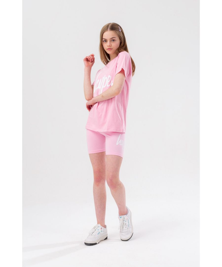 The HYPE. Girls Pink Script Kids T-Shirt and Shorts Set is perfect for everyday wear. Designed in a soft-touch fabric for the ultimate comfort. The tee features our girls t-shirt standard shape, designed in a 100% cotton fabric base with a crew neckline and short sleeves for a classic fit, finished with the iconic HYPE. script logo in a contrasting white across the front. The cycle shorts pair perfectly with the tee, designed in a micro poly fabric base with an elasticated waistband for extra breathing room and finished with the iconic HYPE. script logo on the leg in a contrasting white. Machine washable.