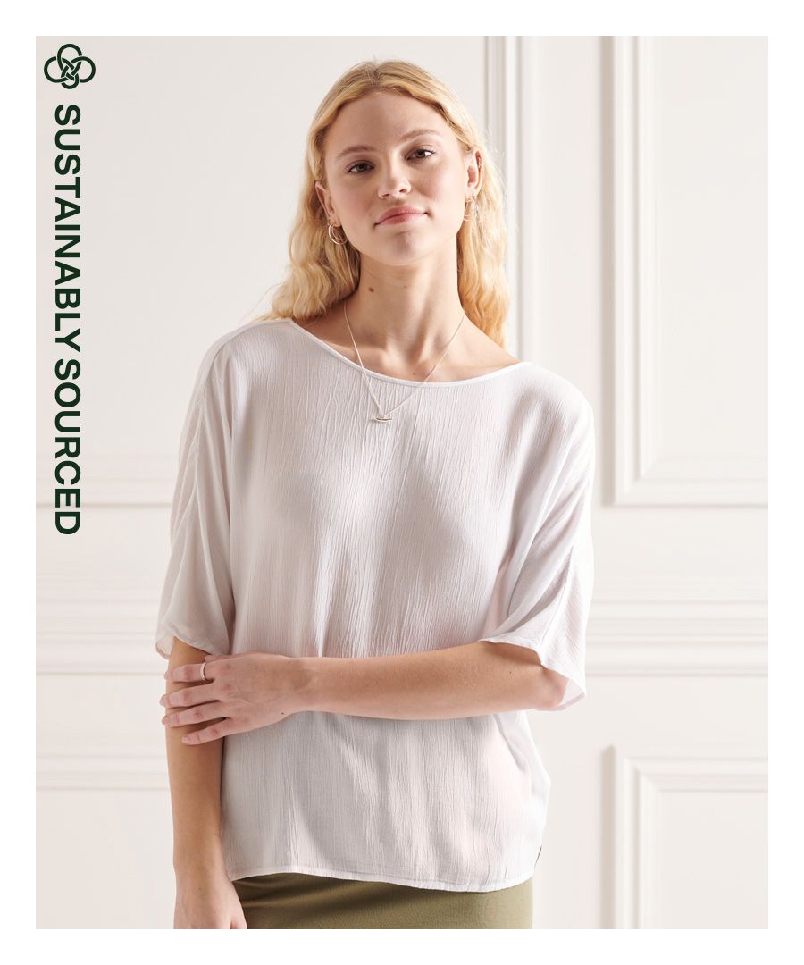 Sophisticated and minimal; the studios woven top will make a great new addition to your wardrobe this season. Style with jeans and boots to complete the look.Loose Fit – where comfort meets cool, a stylish loose cut makes this a must-have shapeShort sleevesKeyhole tie fasteningSignature logo tabMade using ECOVERO™ – sustainably sourced from responsibly managed forests certified by the Forest Stewardship Council or the programme for Endorsement of Forest Certification scheme.