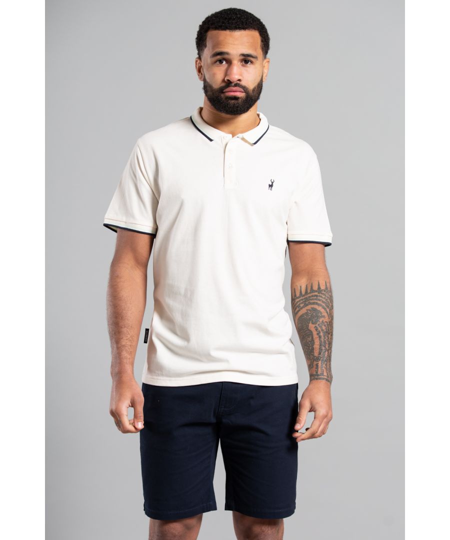 Get a timeless look with Kensington Eastside's classic polo shirt. Made from 100% cotton in a pique knit, it's both comfortable and stylish. Featuring an embroidered logo on the chest, and contrast detail collar this shirt is perfect for casual outings. Shop now and elevate your wardrobe with this versatile piece. This polo is machine washable and easy to care for!
