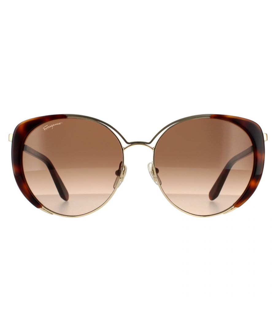 Salvatore Ferragamo Cat Eye Womens Gold Tortoise Brown Gradient Sunglasses SF207S are an oversized contemporary model with cat eye shaped lenses. Thin metal arms are lightweight, and adjustable nose pads ensure all day comfort.. Salvatore Ferragamo's logo features on the temple for brand authenticity.