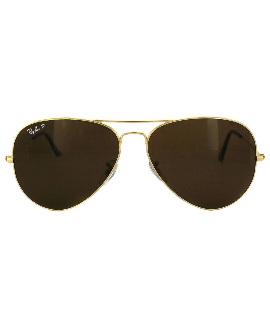 Ray-Ban Sunglasses Aviator 3025 001/57 Gold Brown Polarized were originally designed in 1936 for US military pilots and have since become one of the most iconic sunglasses models in the world. The timeless design is characterised by the thin metal wire frame, large teardrop shaped lenses and fine metal temples that feature silicone tips and nose pads for a customised and comfortable fit. This classic model is available in various sizes and an array of colourways.