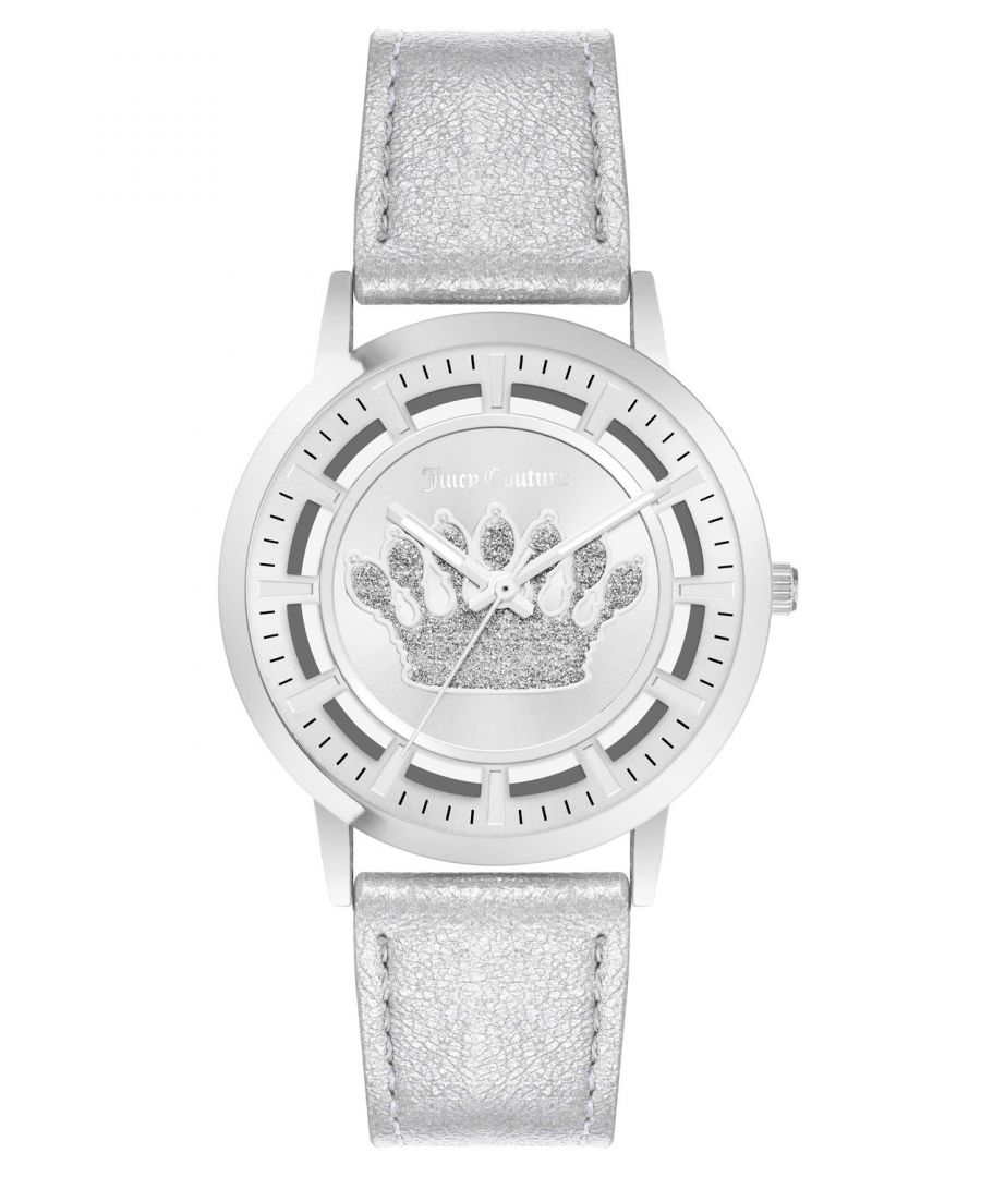 Juicy Couture Watch JC/1345SVSI\nGender: Women\nMain color: Silver\nClockwork: Quartz: Battery\nDisplay format: Analog\nWater resistance: 0 ATM\nClosure: Pin Buckle\nFunctions: No Extra Function\nCase color: Silver\nCase material: Metal\nCase width: 36\nCase length: 36\nFacing: None\nWristband color: Silver\nWristband material: Leatherette\nStrap connecting width: 18\nWrist circumference (max.): 20.5\nShipment includes: Watch box\nStyle: Fashion\nCase height: 9\nGlass: Mineral Glass\nDisplay color: Silver\nPower reserve: No automatic\nbezel: none\nWatches Extra: None