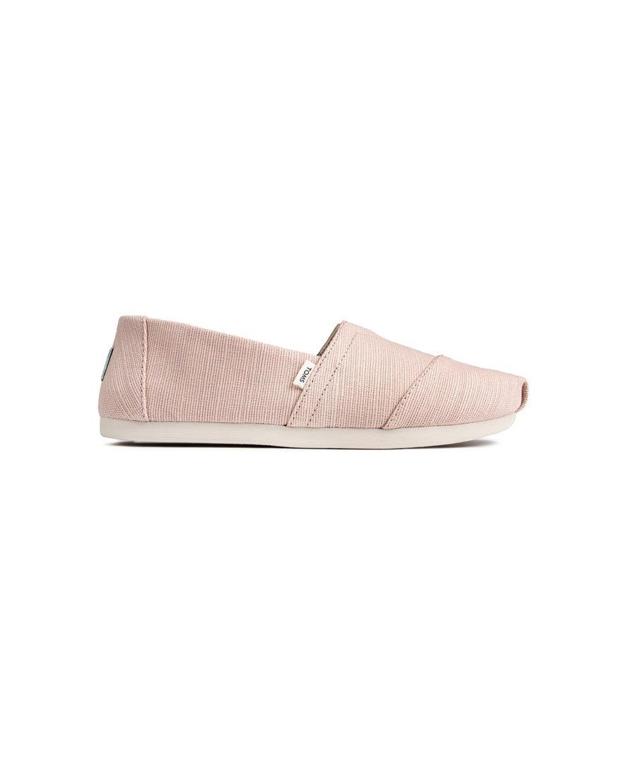 Toms Alpargatas Womens Espadrille Plimsolls Feature A Durable, Pale Pink Canvas Upper, Elasticated Gusset And Lightweight Construction With A Ortholite Foam Insole. This Iconic Silhouete, With Signature Branding, Is Made From Sustainable Materials And Is The Ultimate Casual Footwear, Making It Easy To Transition Your Style Between Seasons Effortlessly.