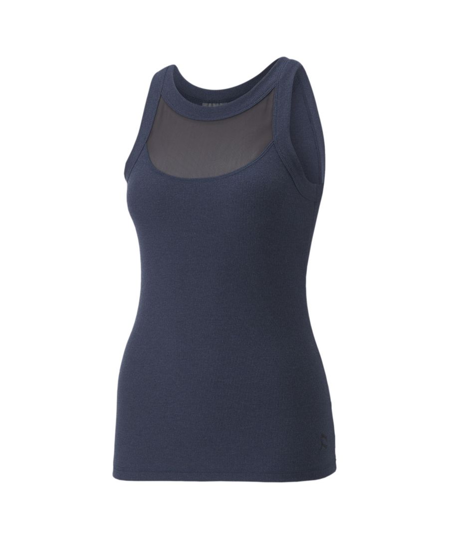 PRODUCT STORY :Layer up your studio look with this premium-quality tank top from PUMA's Exhale collection. Slip it on under a zip or over a sports bra for a look that's as multi-dimensional as your practice. Featuring recycled fabrics and practical power mesh, it looks good, feels good, and does good, too. FEATURES & BENEFITS :Recycled Content: Made with at least 20% recycled material as a step toward a better future. DETAILS :Premium recycled materials.Recycled power mesh insert.Embroidered shine yin yang cat sign off.
