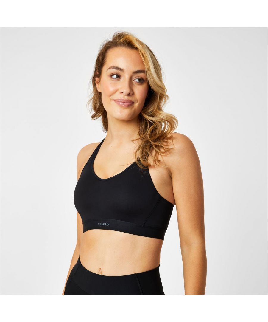 Extreme workouts require extreme support, the USA Pro High Impact Sports Bra is crafted with adjustable crossover straps for complete support when performing high-intensity exercises. This design is finished with a hook and eye fastening and padded bust for complete security as you sweat it out. Available in two classic colours, this sports bra is a key item for you activewear wardrobe.