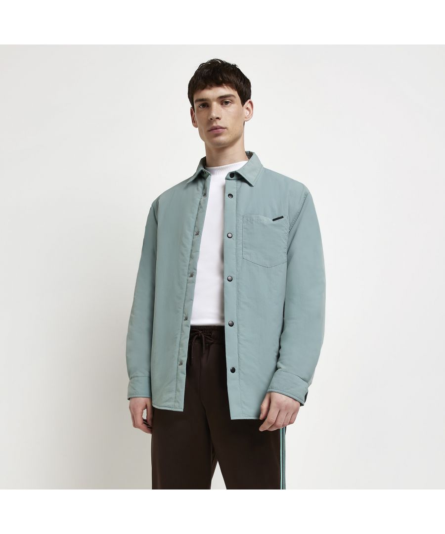> Brand: River Island> Department: Men> Colour: Green> Type: Button-Up> Material Composition: 100% Nylon (polyamide)> Material: Nylon> Neckline: Collared> Sleeve Length: Long Sleeve> Pattern: No Pattern> Occasion: Casual> Size Type: Regular> Season: SS22