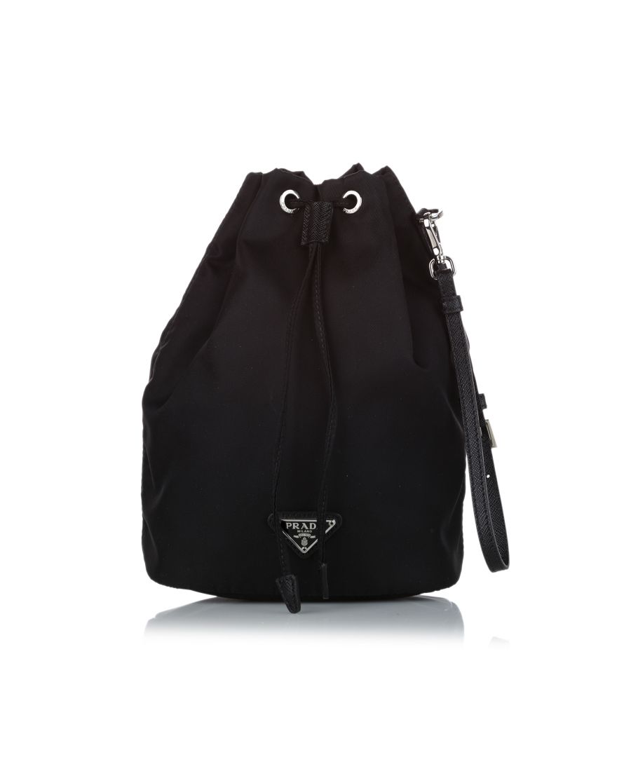 VINTAGE. RRP AS NEW. The Tessuto bucket bag features a nylon body, a flat leather strap, and a top drawstring closure.Exterior Botton stained with Other. Exterior Botton stained with Other. \n\nDimensions:\nLength 22cm\nWidth 16cm\nDepth 10cm\nHand Drop 19cm\nShoulder Drop 19cm\n\nOriginal Accessories: This item has no other original accessories.\n\nSerial Number: 42\nColor: Black\nMaterial: Fabric x Nylon x Leather x Calf\nCountry of Origin: Italy\nBoutique Reference: SSU130978K1342\n\n\nProduct Rating: GoodCondition\n\nCertificate of Authenticity is available upon request with no extra fee required. Please contact our customer service team.