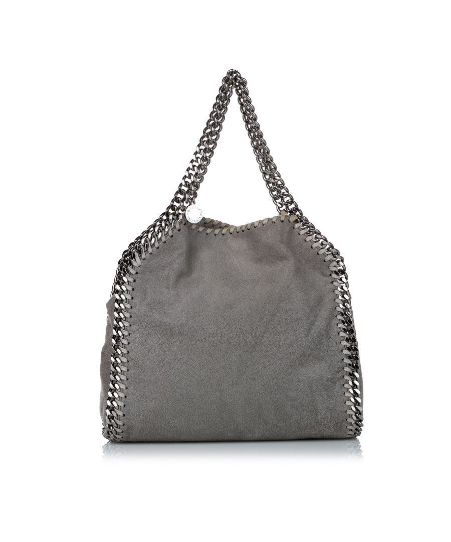 VINTAGE. RRP AS NEW. The Falabella features a fabric body, silver-tone chain straps, a top magnetic closure, and an interior slip pocket.Exterior Front Discolored. Exterior Back Discolored. Metal Attachment Scratched. Exterior Front Discolored. Exterior Back Discolored. Metal Attachment Scratched. \n\nDimensions:\nLength 27cm\nWidth 25cm\nDepth 10cm\nHand Drop 14cm\nShoulder Drop 46cm\n\nOriginal Accessories: Dust Bag, Box, Authenticity Card\n\nSerial Number: 371223 W9132 SP17495151 06\nColor: Gray\nMaterial: Fabric x Others\nCountry of Origin: Italy\nBoutique Reference: SSU173382K1342\n\n\nProduct Rating: GoodCondition\n\nCertificate of Authenticity is available upon request with no extra fee required. Please contact our customer service team.
