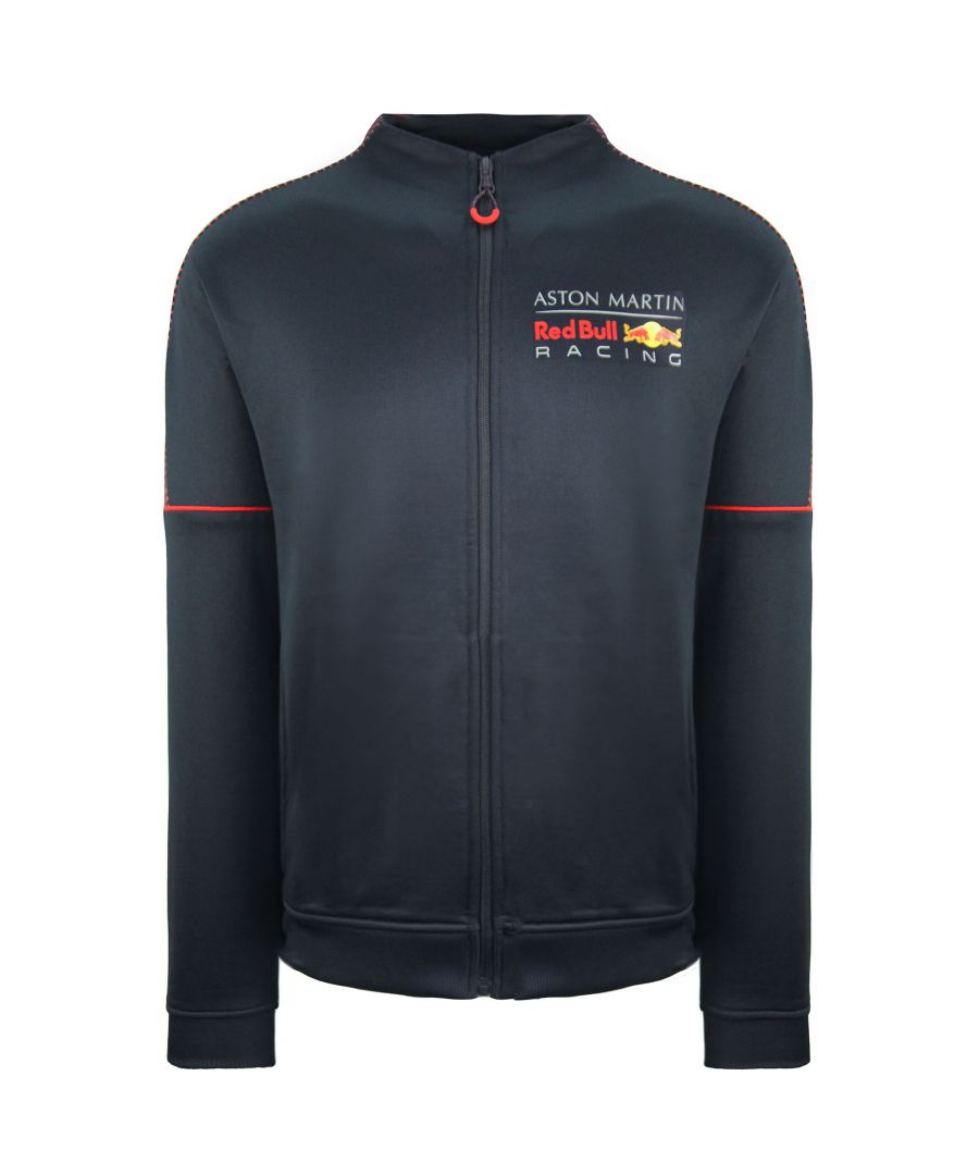 Sporty yet stylish and featuring a unique new neck line, elasitc rib cuffs and side pockets. Official licensed Red Bull Racing product. Part of the Official fanwear collection, including team and driver branded jackets, t-shirts, sweaters, accessories and more.