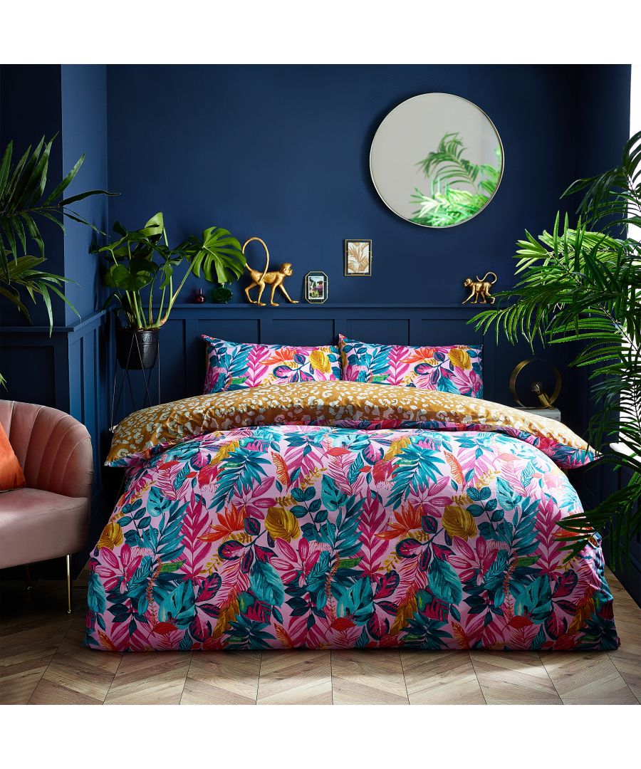 The colourful masterpiece is a tropical delight with vibrant pinks and blues coupled with golden touches. The flip side brings you a leopard in biscuit and caramel tones.