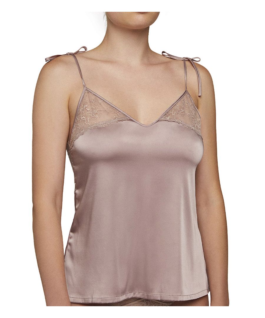This Isabel Mora Camisole is in a soft satin material with floral lace detail on the cups and back. The straps tie at the shoulders for a comfortable, adjustable fit depending on your body height. We sell matching shorts for the perfect nightwear or lounge set.