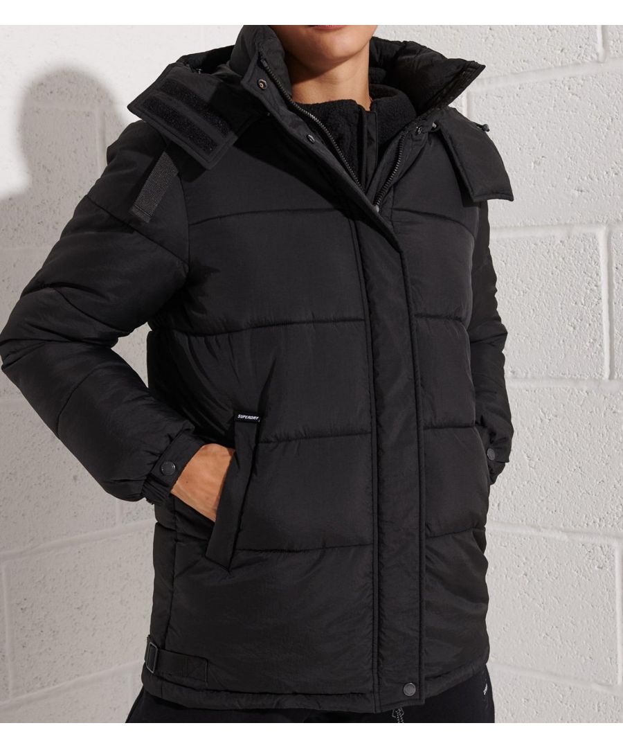 • SHELL / 100% NYLON • Fully lined hood with bungee cord adjuster. Two-way zip fastening with popper fastened storm flap. Two external pockets with popper fastenings. Fully lined