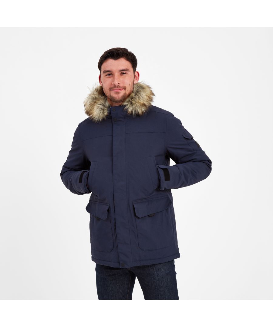 When you need a toasty warm coat that is waterproof, windproof and yet fully breathable, our Garrick parka won't let you down. Designed in Yorkshire to stand up to the wildest winter weather, this robust coat is fully waterproof and windproof with all the good looks of casual cotton twill. Garrick also has an extra water repellent coating and taped seams that act as a barrier to rain. The thermal filling and silky taffeta lining, along with the cosy hood with a handy Velcro adjuster and removable faux fur hood trim, will make sure you stay snug on the coldest days. Garrick makes an ideal commuter coat and is also perfect for long walks across the moors as it not only protects against the elements, but has an abundance of pockets to keep your possessions safe and your hands warm if you forget your gloves. The full length zip is secured with press studs and Velcro and opens at both ends, making it easy to slip on and off. This classic parka has a streamlined shape and proudly displays our embossed rubber Yorkshire Rose badge on the sleeve.