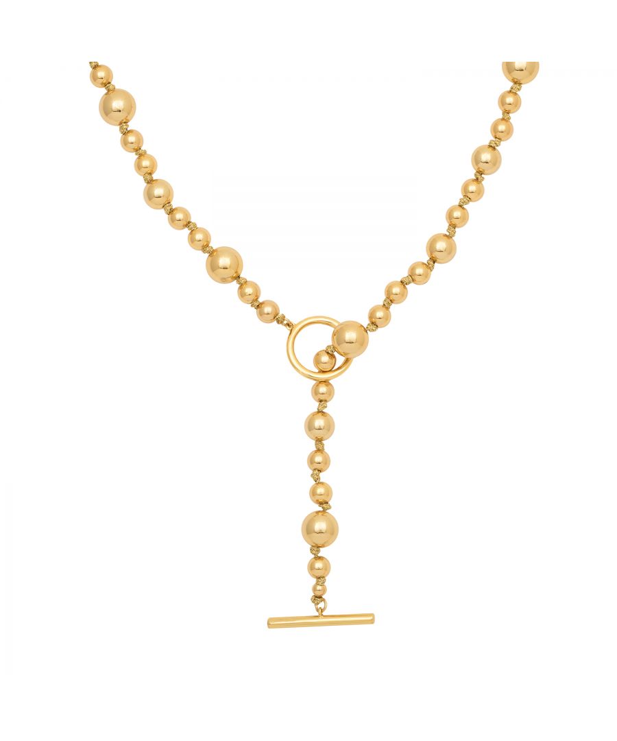 The Kate Thornton Gold Artisan Ball Necklace is a classic piece that can be worn with any outfit. Featuring a chain of gold plated balls on a front hoop and bar fastening, it is an elegant way to add glamour or style to any occasion. Measuring 17inch in total length but can be worn at any length with a drop. Presented in a Ktx jewellery pouch to keep safe or make the perfect gift!