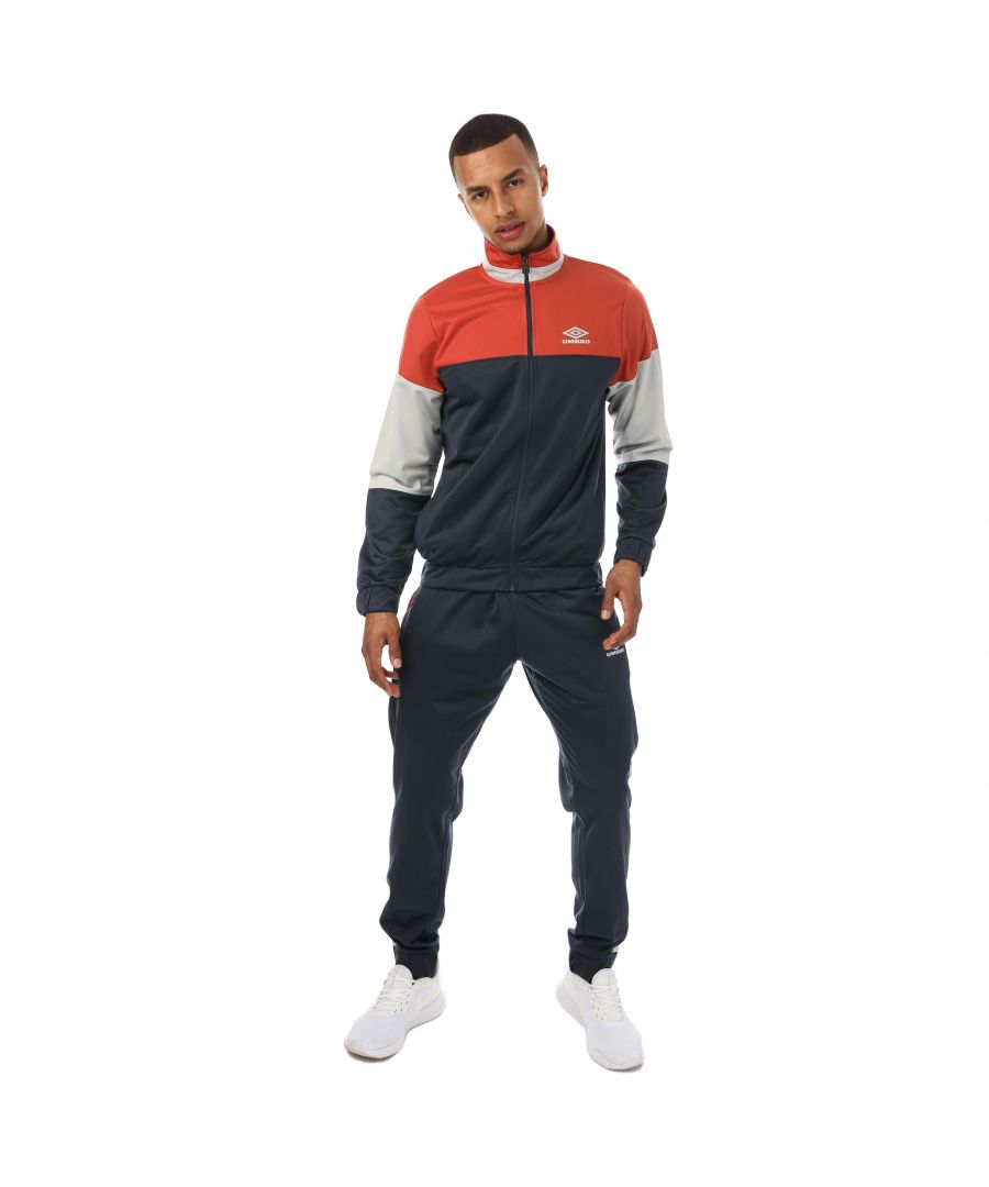 Mens Umbro Diamond Knitted Poly Tracksuits in navy.- Jackets:- Reverse coil zip puller.- Side slip pockets.- Zip fastening.- Contrast sleeve & front panel.- Elasticted cuff and hem.- 100% Polyester.- Bottoms:- Grown on waistband with inner drawcords.- Slide slip pockets.- Contrast panels to leg.- Transfer print to leg.- Elasticted cuff.- Zips to side leg.- Slim fit.- 100% Polyester.- Ref: UMJM0637OG7NAV
