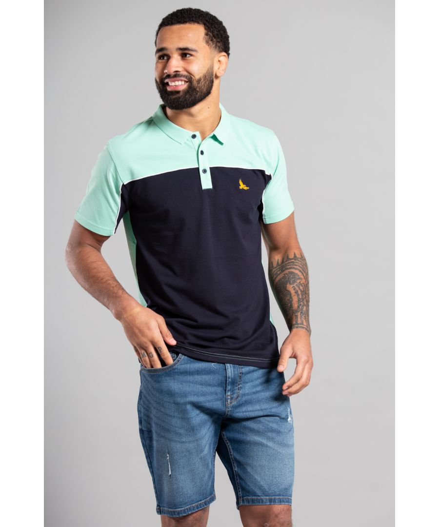 Get a timeless look with Kensington Eastside's classic colour-block polo shirt. Made from 100% cotton in a pique knit, it's both comfortable and stylish. Featuring an embroidered logo on the chest, this shirt is perfect for casual outings. Shop now and elevate your wardrobe with this versatile piece. This polo is machine washable and easy to care for!