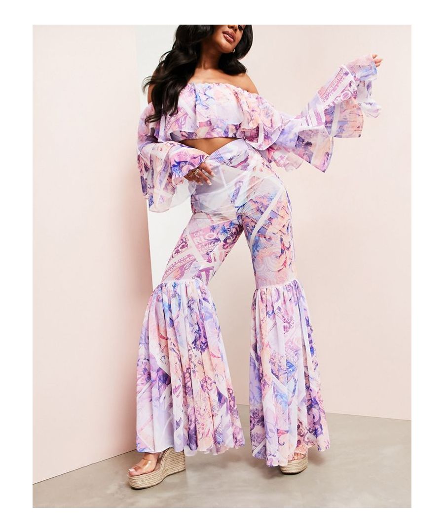 Trousers by ASOS LUXE Dreaming of the beach All-over print High rise Ruffle hem Flared skinny fit  Sold By: Asos