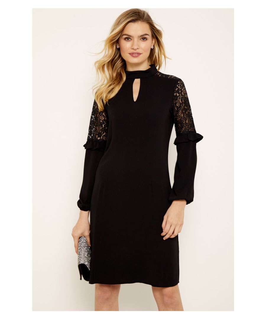 REASONS TO BUY: \n\n Because classic doesn’t mean boring\n Flattering figure-skimming shift \n An evening dress with sleeves – hurrah!\n Statement lace sleeves, on-trend high neck\n It’ll always be in style\n Black courts look effortlessly chic