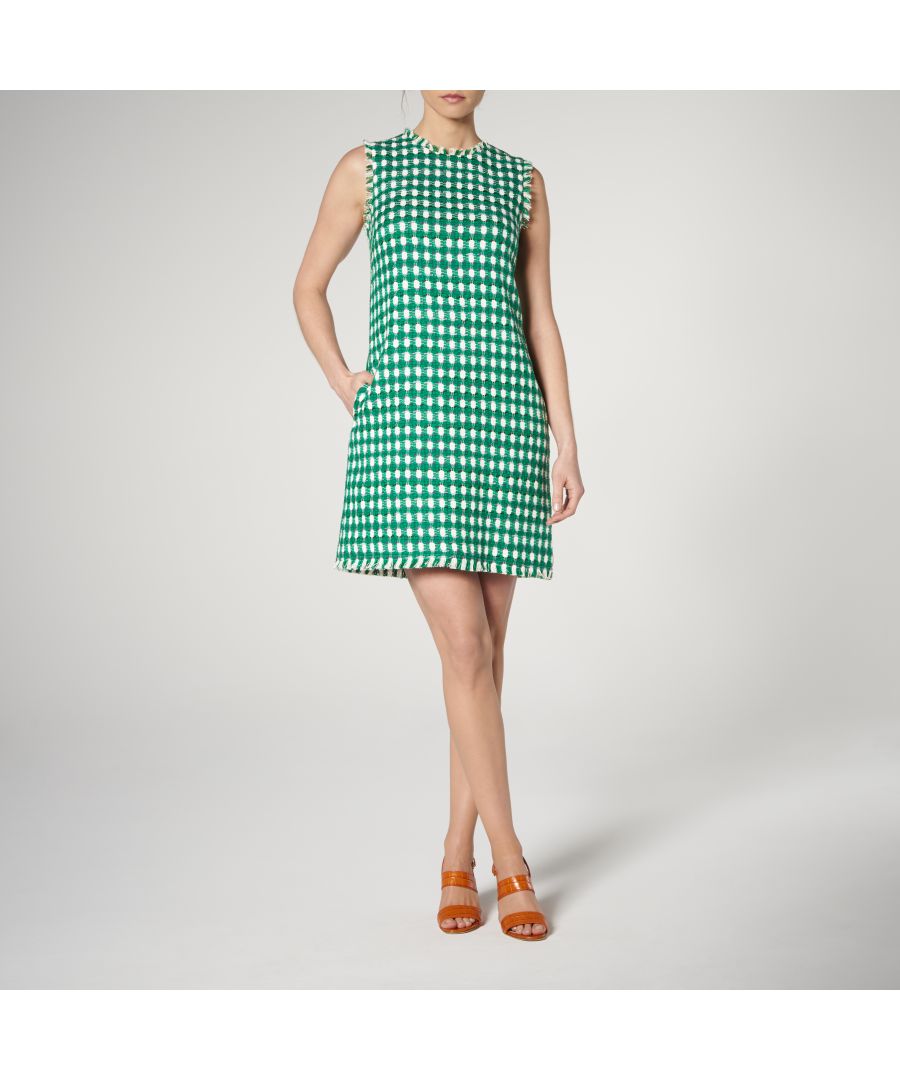 A playful riff on classic gingham, Tammy features a bold, scaled up check on tactile Linton tweed and is finished with a stylish raw edge. This round neck, sleeveless shift looks great styled with a chic pair of flats or dressed down with sun-ready espadrilles. 