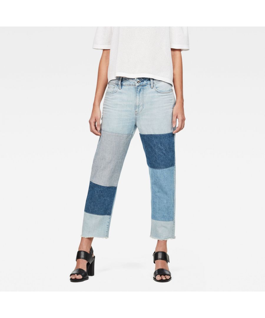 Mid waist. Regular waistband. Narrows down from top to bottom. Zip fly. Zip & button closure. Mid waist. The 3301 Mid waist Boyfriend Ripped 7/8-Length Jeans is cut from dry denim with a timeless 3X1 weave and mid-blue shade of indigo. Midweight 13 oz denim. Rich texture. Tough construction. Boyfriend