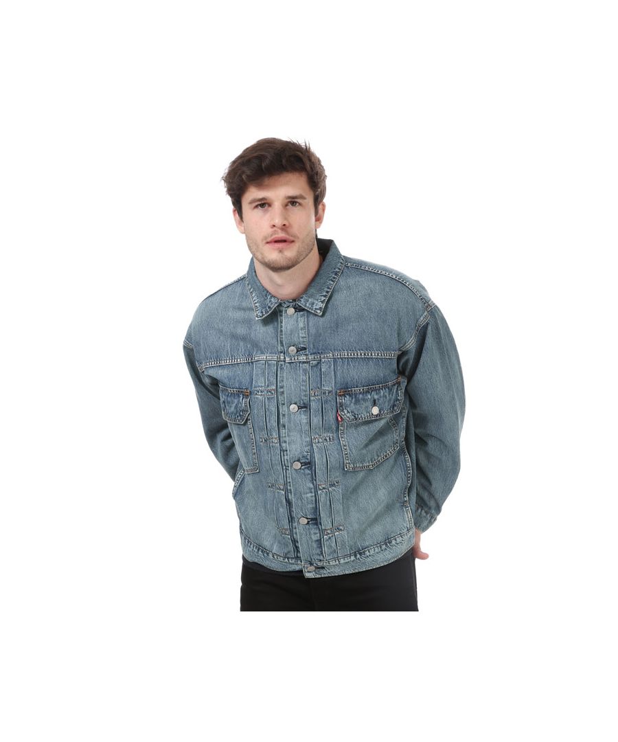 Mens Levi's Modern Type Trucker Jacket in denim.<br><br>- Full button placket with branded metal shanks.<br>- The iconic trucker jacket  updated with a slightly relaxed fit and longer silhouette.<br>- Floral embroidery on reverse.<br>- Button cuffs.<br>- Button-flap chest pockets.<br>- Side hand pockets.<br>- Side hem adjusters<br>- Relaxed fit. <br>- 98% Cotton  2% Elastane.  Machine wash at 30 degrees.<br>- Ref: 852420008