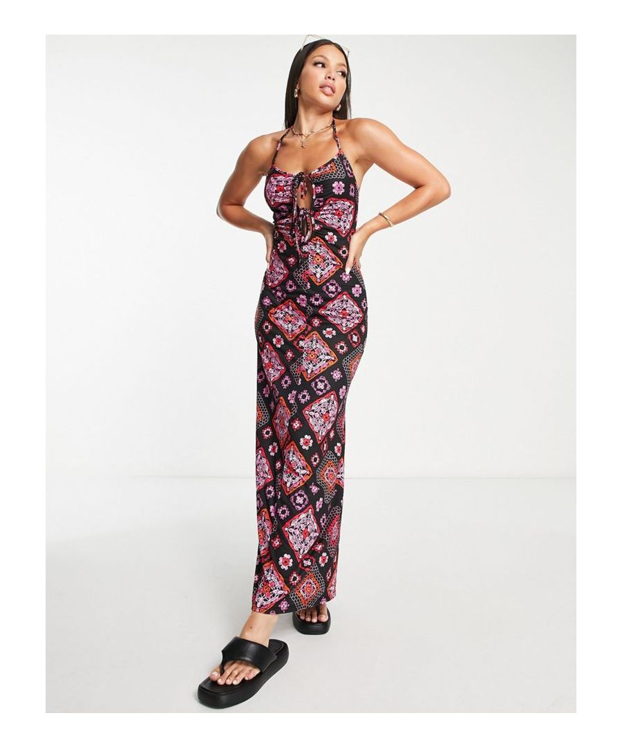 Tall dress by ASOS DESIGN A round of applause for the dress Ditsy print Scoop neck Halterneck style Cut-out detail Regular fit Sold by Asos