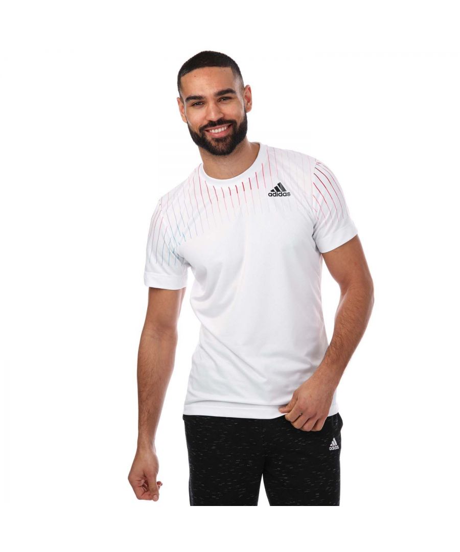 Mens adidas Melbourne Tennis Freelift Printed T- Shirt in white.- Crew neck.- Short sleeves.- Breathable fabric.- Moisture-absorbing AEROREADY.- Elastic cuffs.- FreeLift design.- Slim fit.- Main Material: 100% Polyester (Recycled).- Ref: HA3344