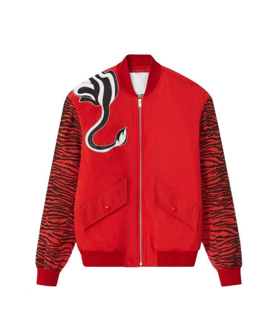This red Bomber Jacket from Kenzo is the product of a collaboration with Kansaiyamamoto. It features a 'Mountain Lion' motif embroidery, zebra print on the the sleeves, two flap pockets, a zipped interior pocket and zip fastening.
