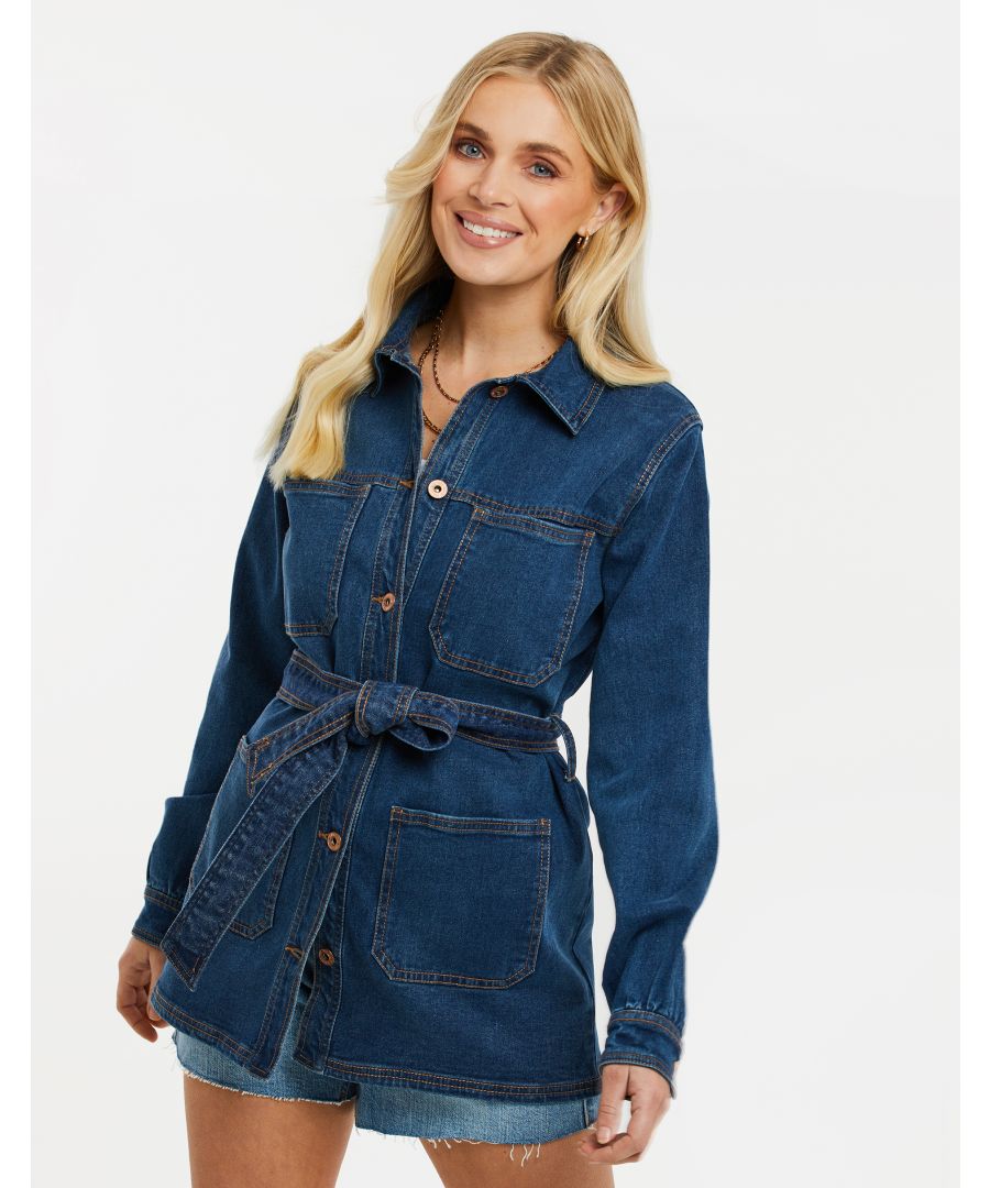 This longline cotton denim shacket from Threadbare features a classic collar, a tie belt, and button fastening cuffs. The shacket also has two chest pockets and two front pockets.  A perfect option for a cute, casual look. Also available in other denim washes.