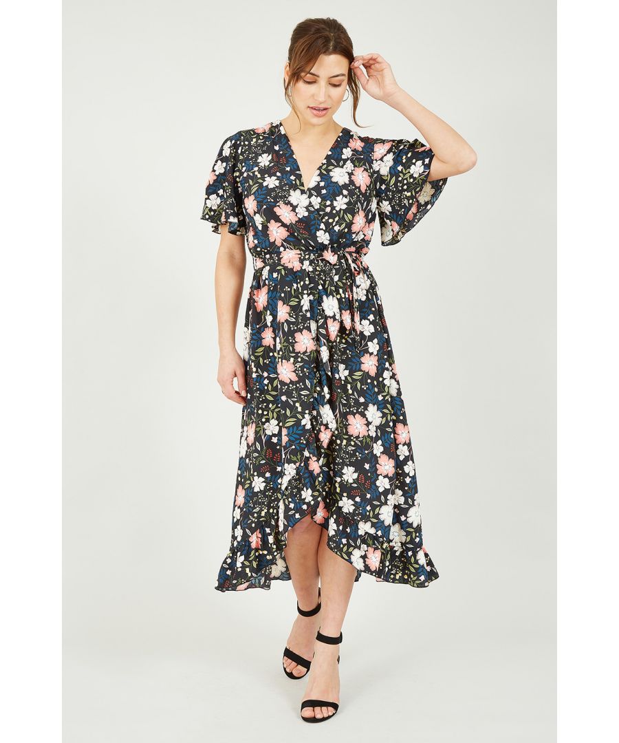 Floral are forever, and this Mela dress is adorned with florals that any garden would be proud of. A pretty fluttery sleeve tops the elegant v-neckline of this piece. The Midi length shows a split in the front from the wrap style, and a ruffle finishes the hem all around. Keep it simple in a black strappy sandal and gold jewellery to style this piece for the perfect date night fit.