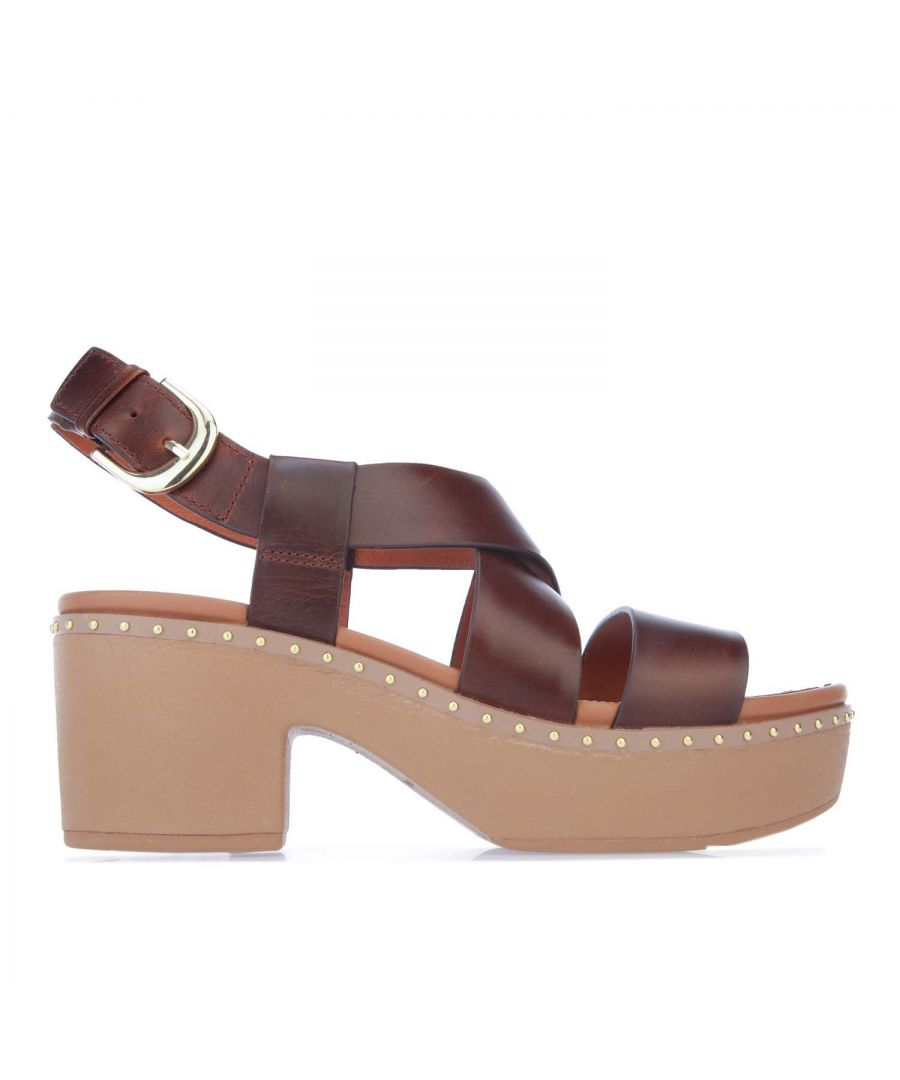 Womens Fit Flop Pilar Back-Strap Leather Clogs in chocolate.- Leather upper.- Buckle closure. - Lightweight design and hidden cushioning.- Underfoot cushioning inside a firm shell.- CushX technology.- Slip-Resistant Rubber sole.- Leather upper and lining.- Ref.: BK1167A